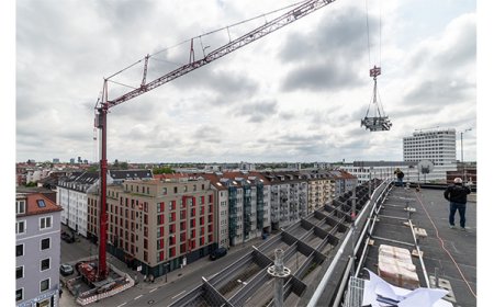 Liebherr's mobile construction crane excels alongside a prominent road
