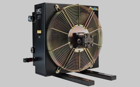 What is the purpose of having a hydraulic oil cooler?