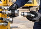 Dry-break hydraulic couplings for spill-free fluid transfer